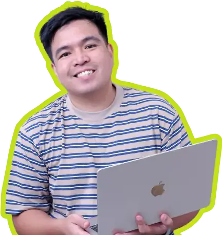 Mark Kevin Rigor, smiling, holding an open laptop at his side.